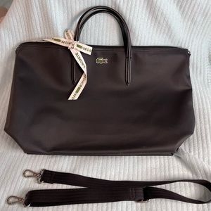 Lacoste bag.  Dimensions : 38cm length , 30cm height, 16cm width